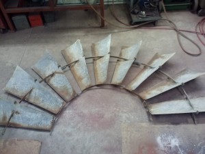 rusty half wheel